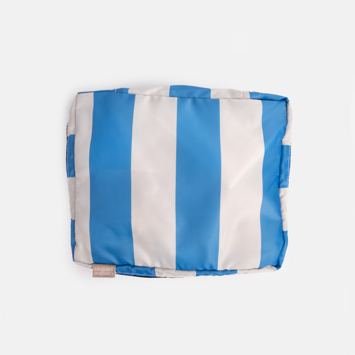 small packing cube in blue and white candy stripe