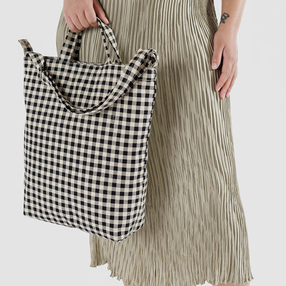 black & white gingham tote bag with shoulder straps, made by Baggu
