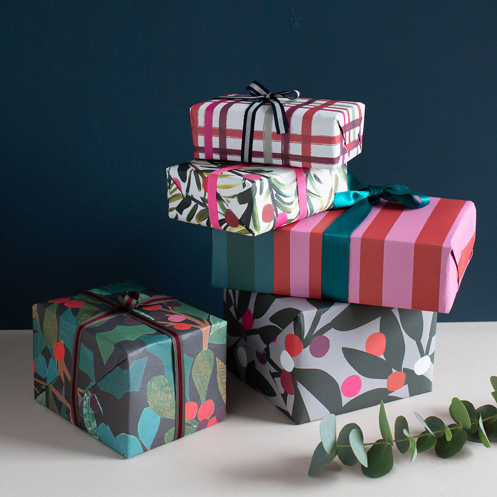 Stack of colorful gift boxes with a dark blue background