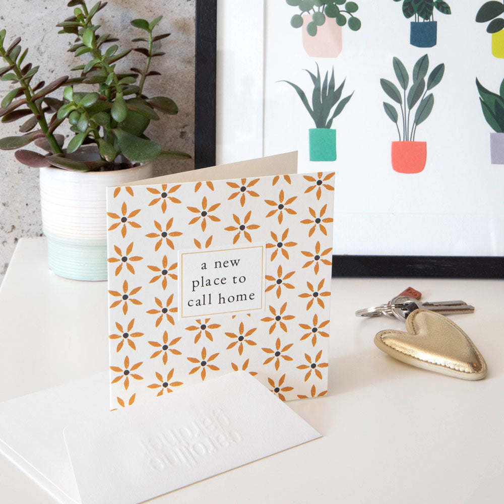 gold art deco flowers 'a new place to call home' card