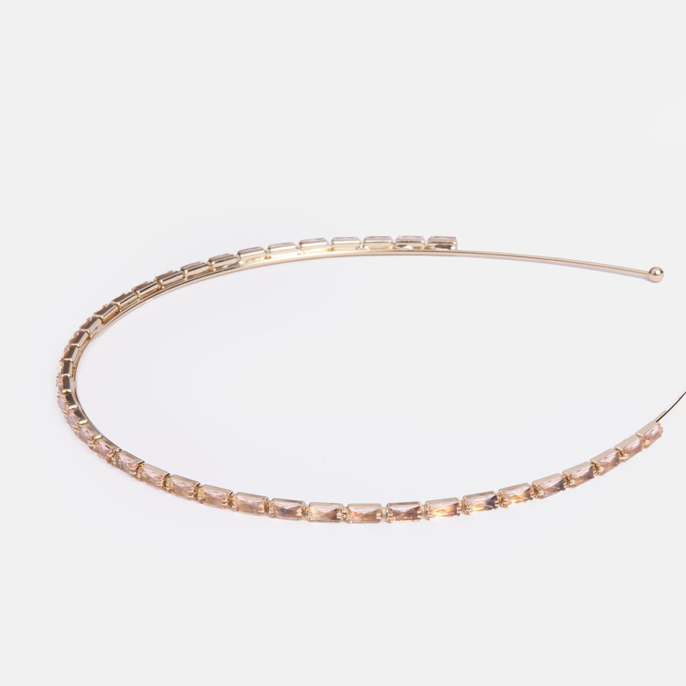 thin gold headband set with pale peach crystals