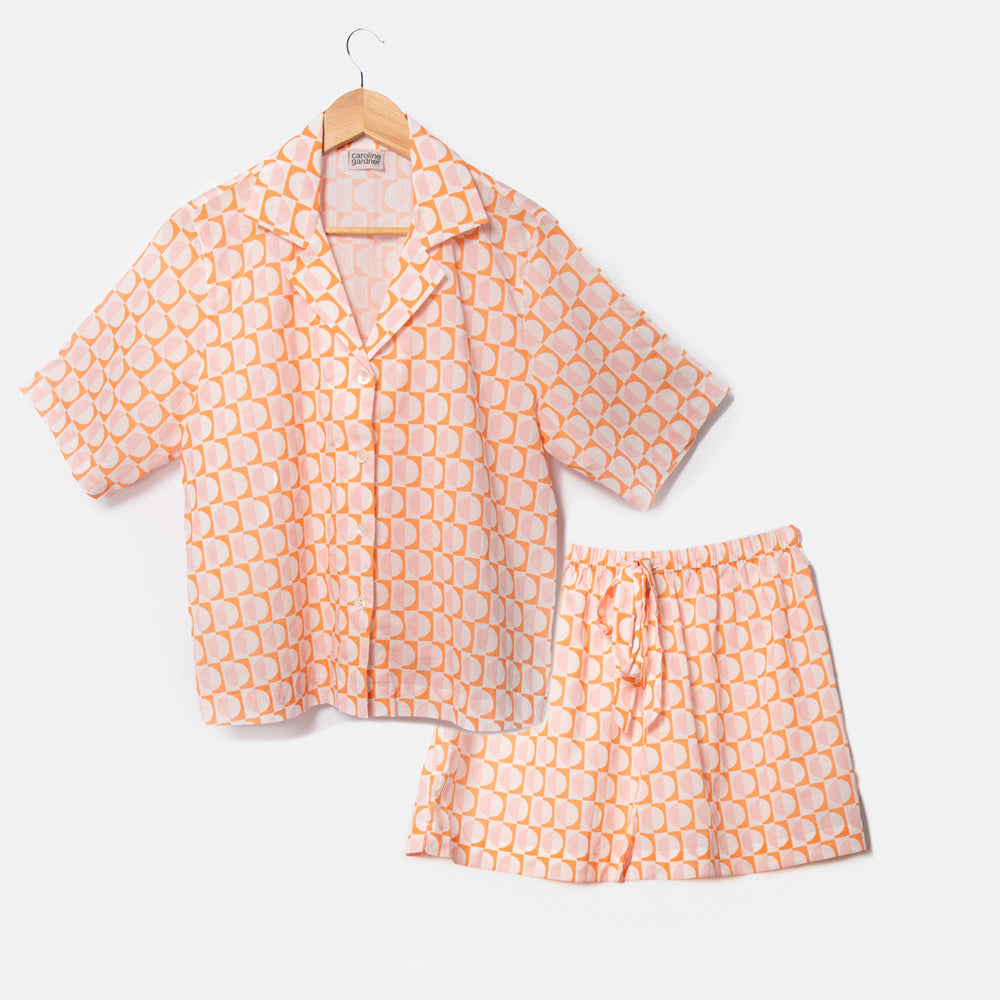 pastel pink & orange geometric circles print cotton pyjama set with shorts and revere collar short sleeved shirt