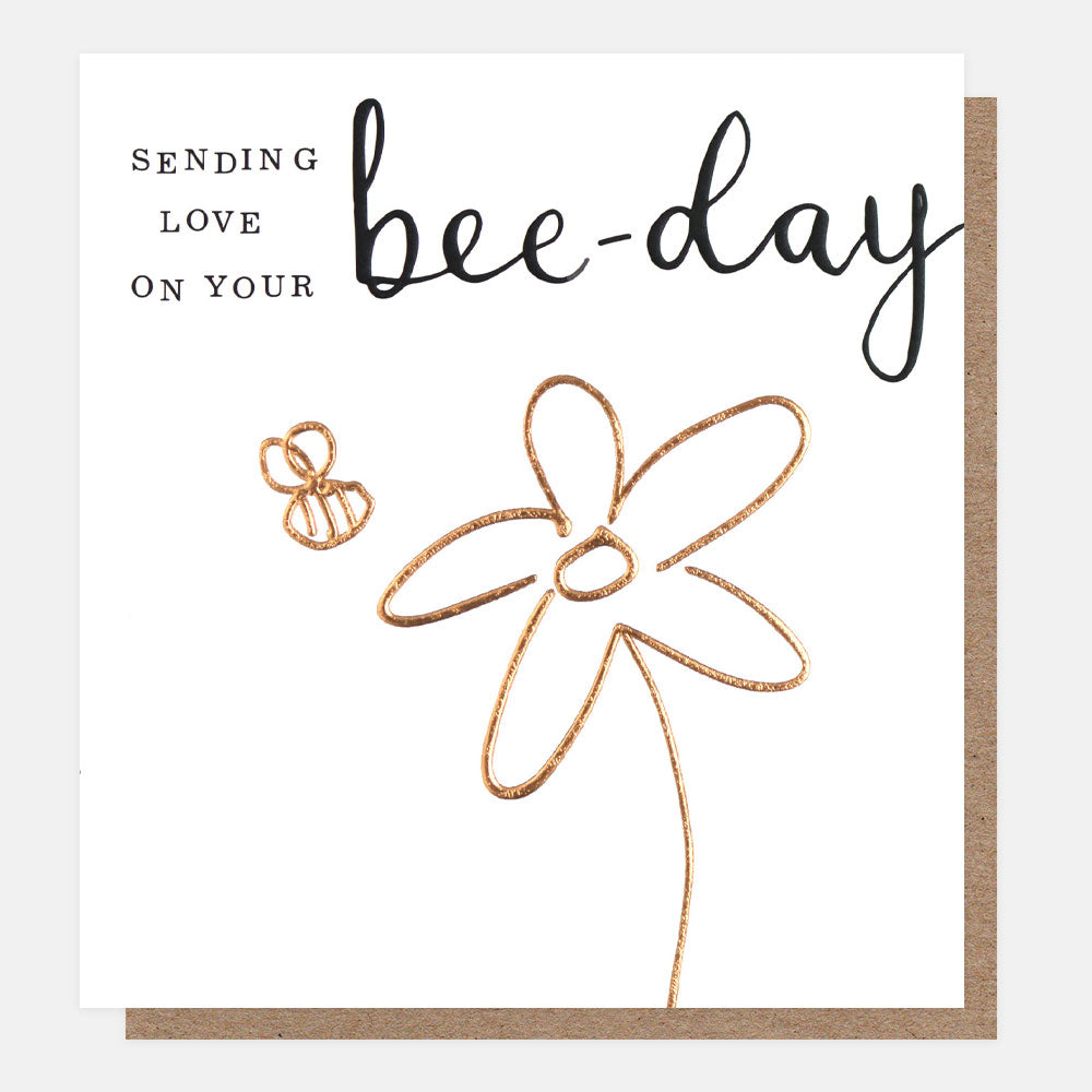 sending love on your bee-day slogan birthday card with gold bee and flower design on white background