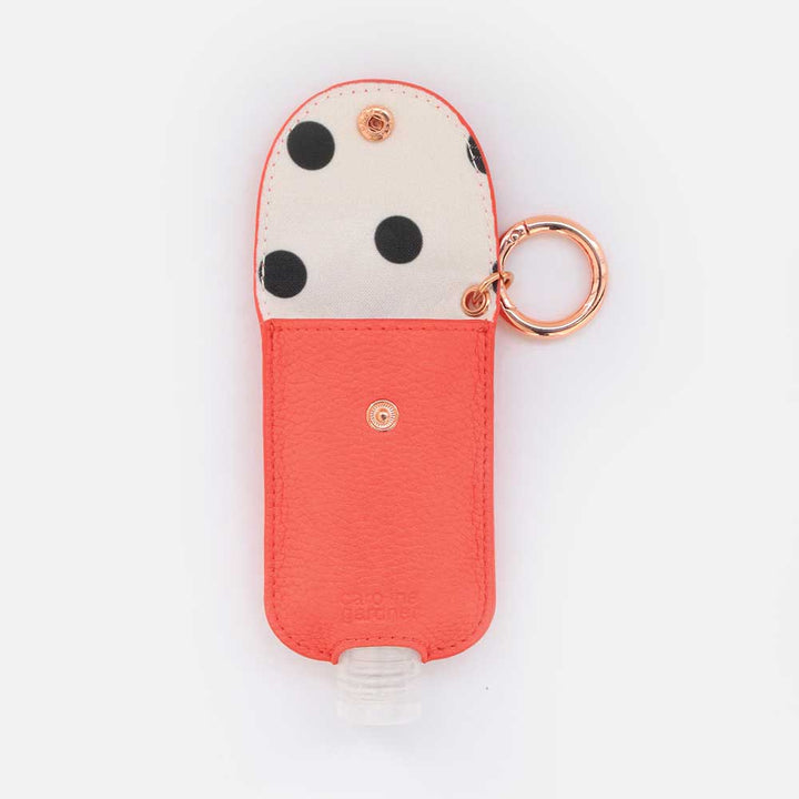 Coral Hand Gel Holder with spotted inner lining