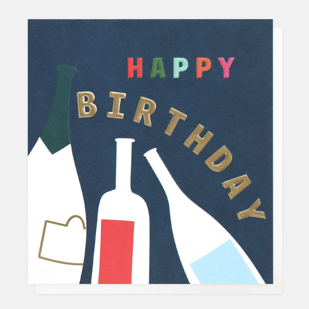 happy birthday slogan card with wine and champagne bottles on a navy blue background