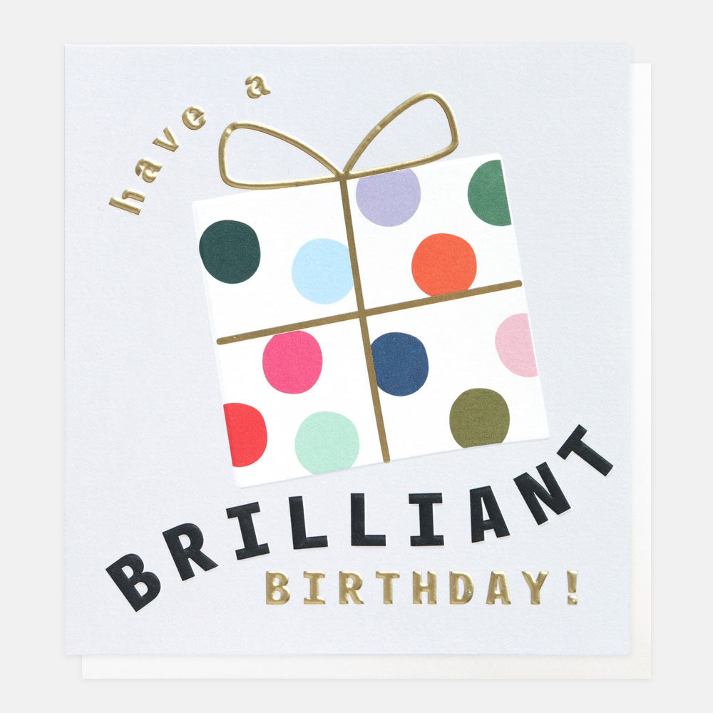 have a brilliant birthday slogan birthday card with gift wrapped spotty present on a light grey background