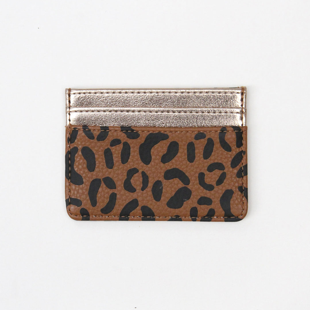 Card holder in leopard print and gold pockets