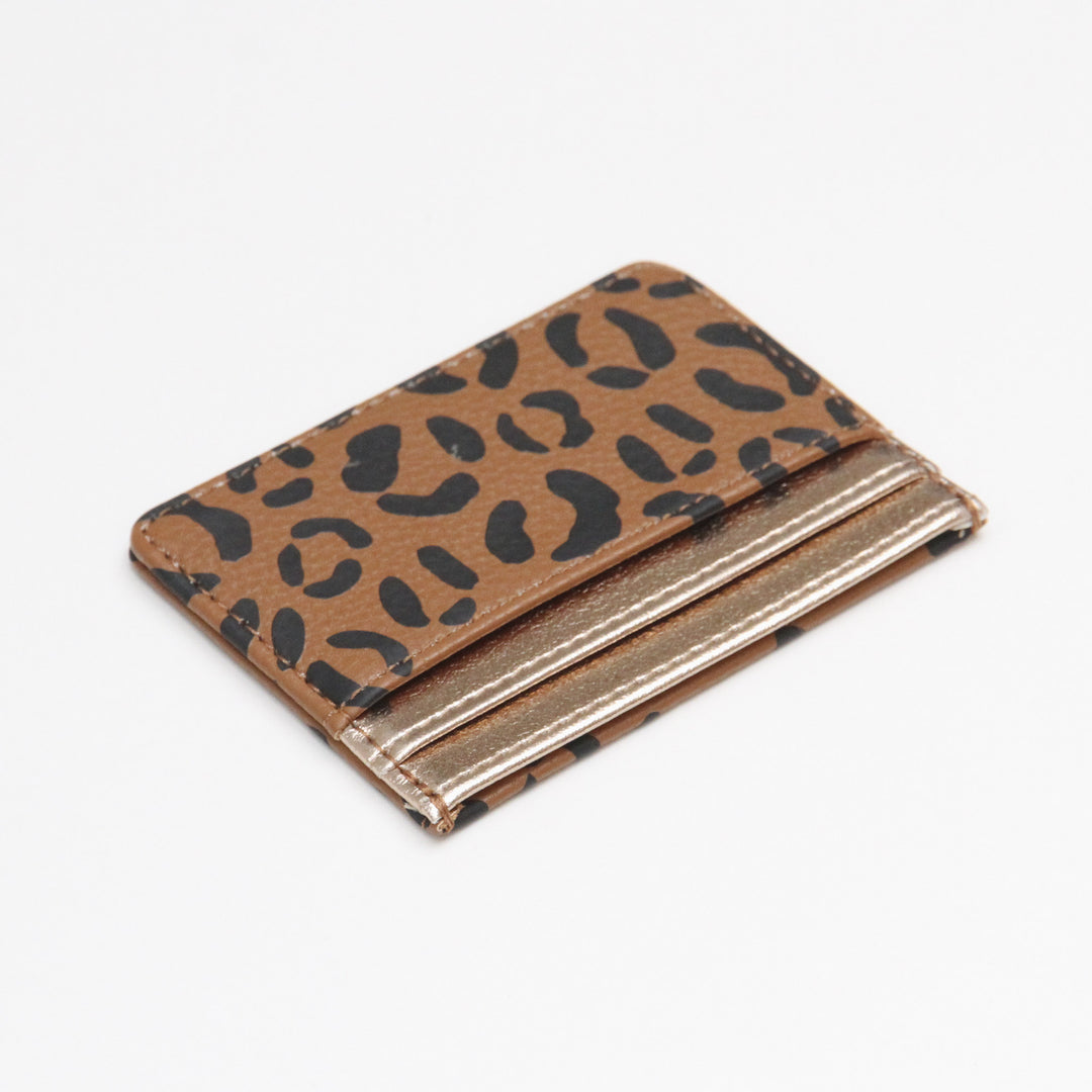 Card holder in leopard print and gold pockets
