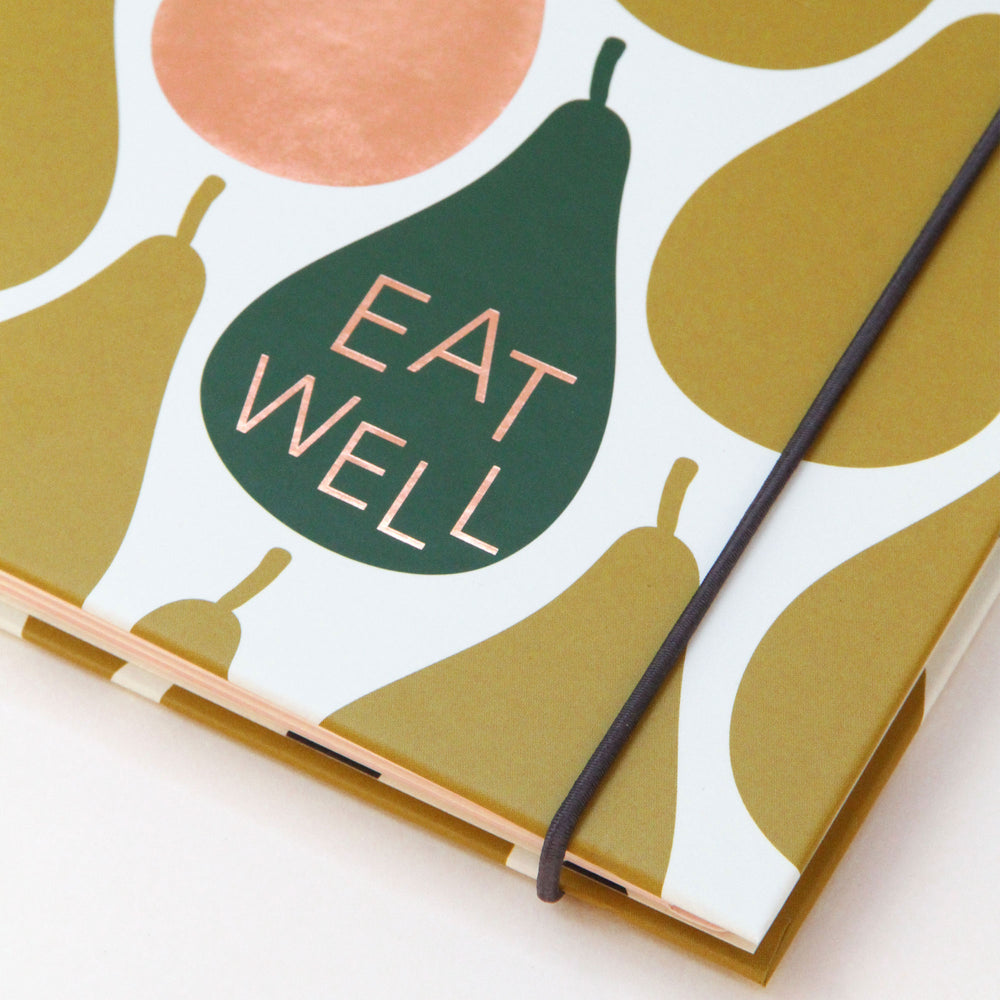 Detail of recipe food journal with green pears