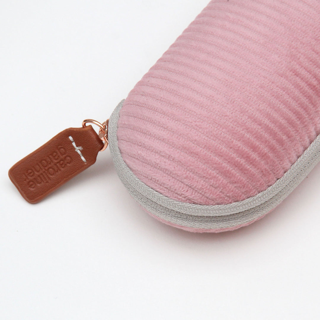 Detail of hard case for glasses in pink cord 