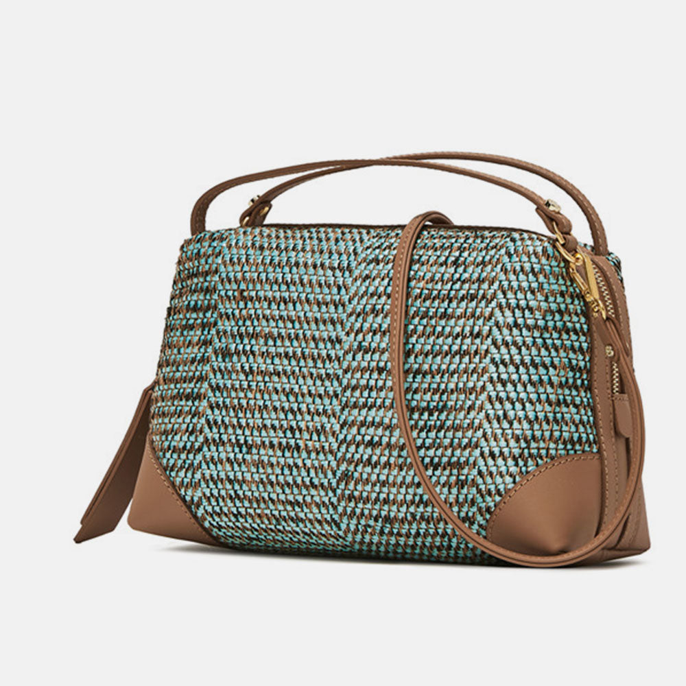 Woven aqua handbag with woven straw detail Caroline Gardner