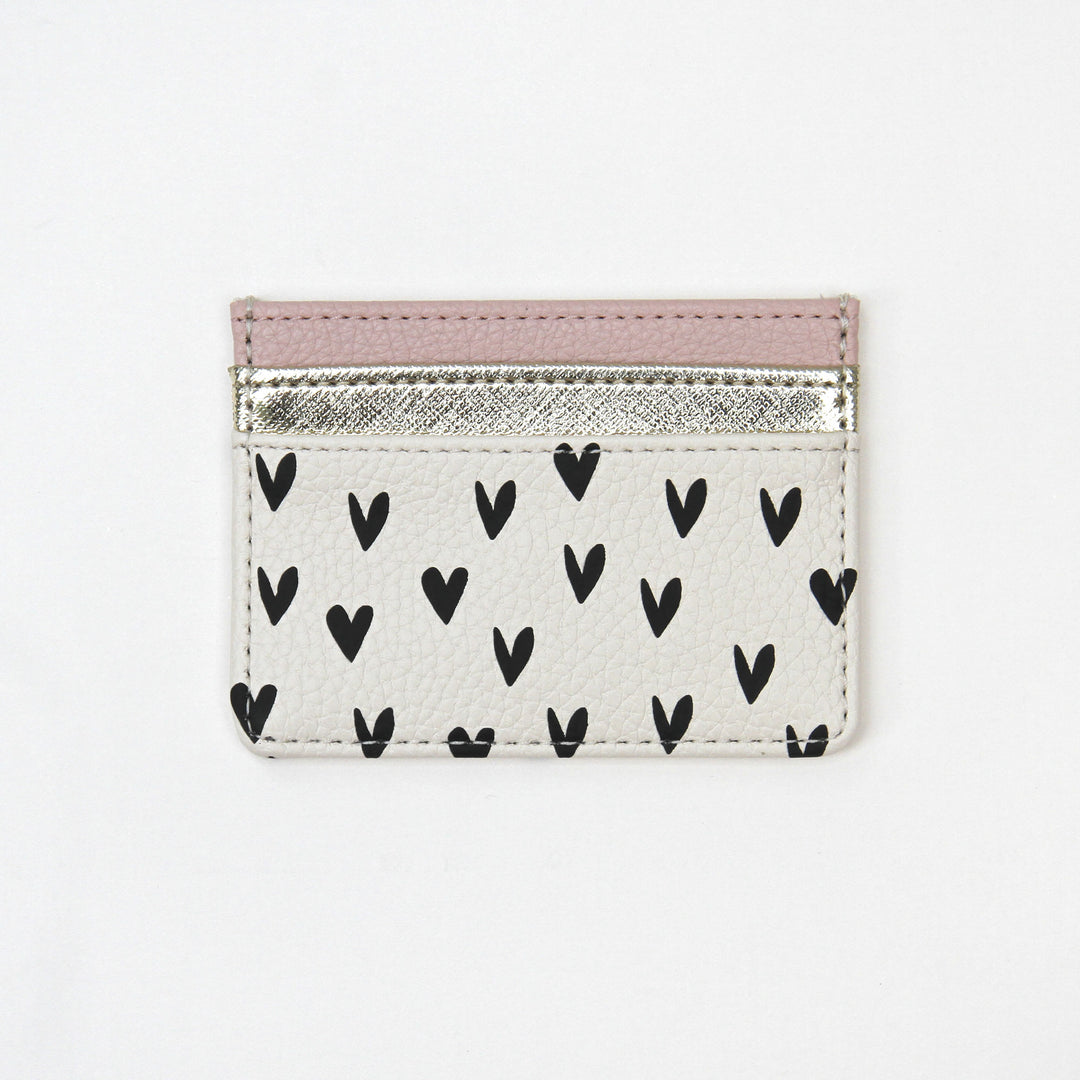Travel card holder with scattered hearts and pockets