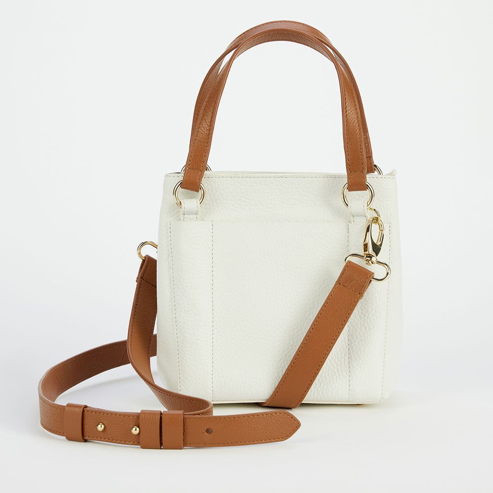 white leather mini crossbody bag with tan leather straps