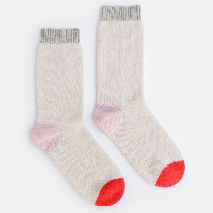 natural, grey, pale pink and coral cashmere bed socks